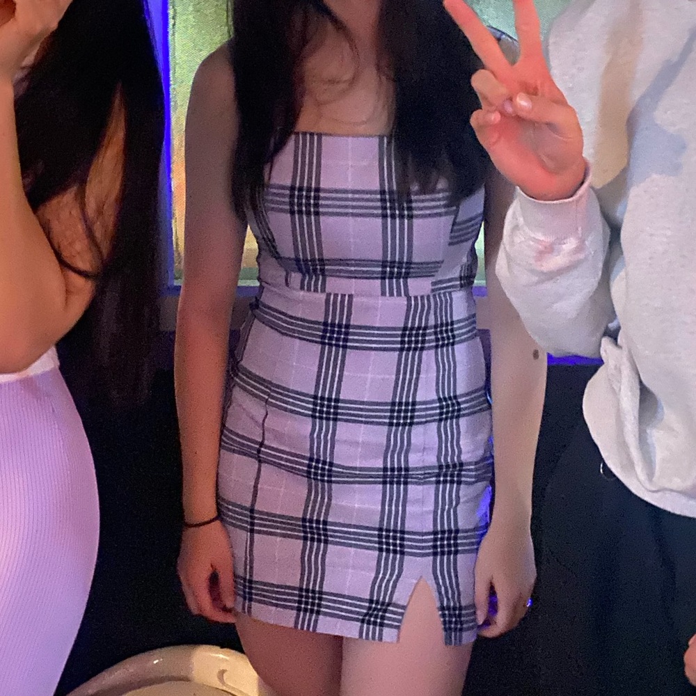 Purple plaid dress.